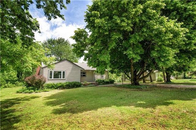 This 3 bedroom, 2 full and 1 half bath home featur
