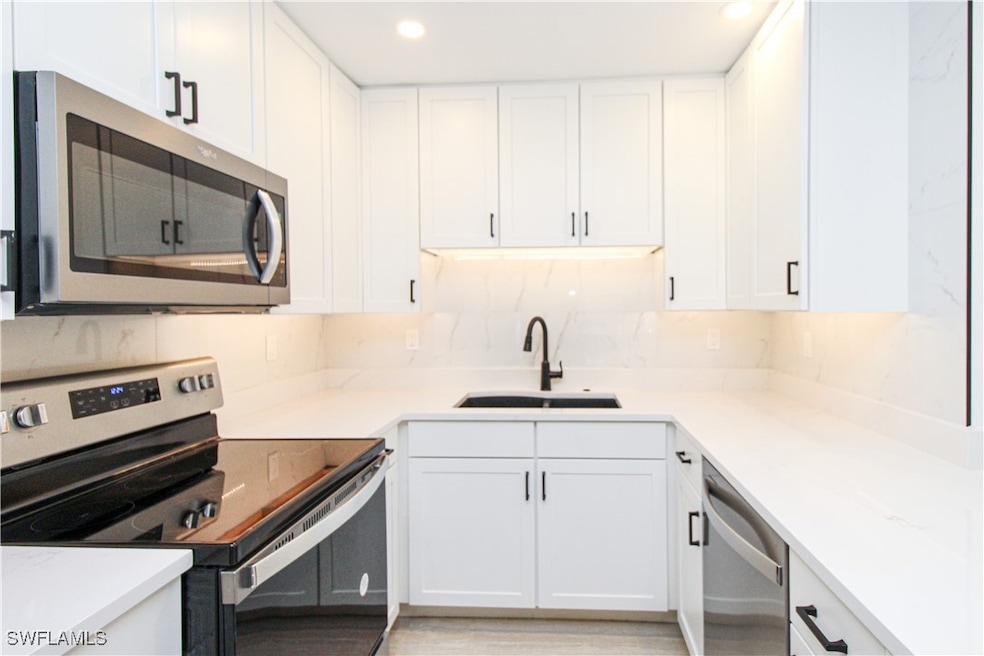 1435 Curlew Ave unit 4, Naples, FL 34102 - photo 1