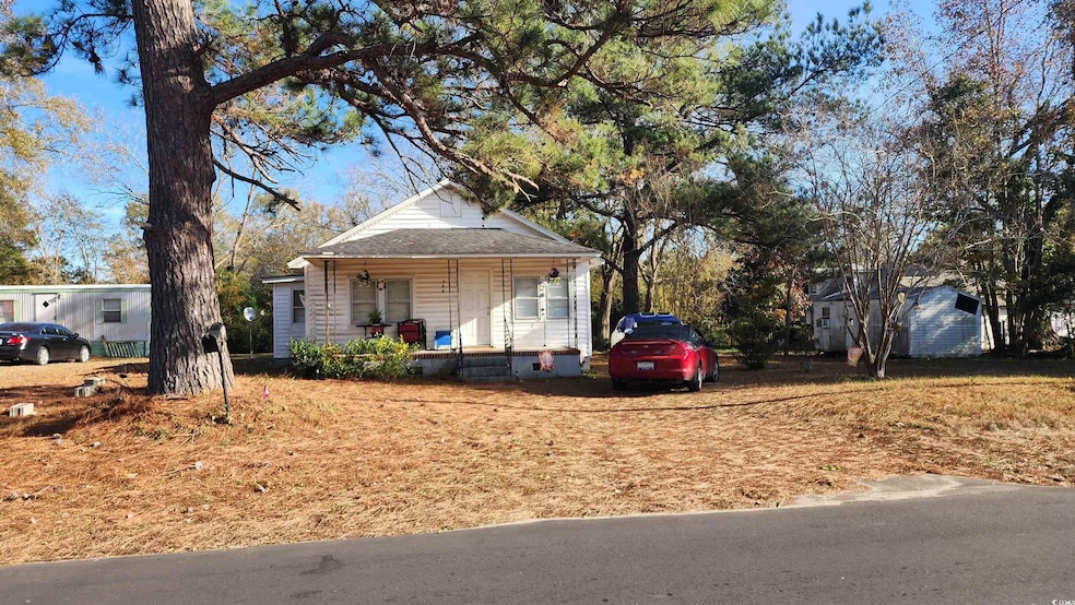 View of front of property featuring covered porch