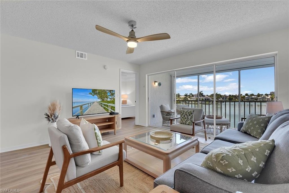 10682 Gulf Shore Dr unit 205, Naples, FL 34108 - photo 1