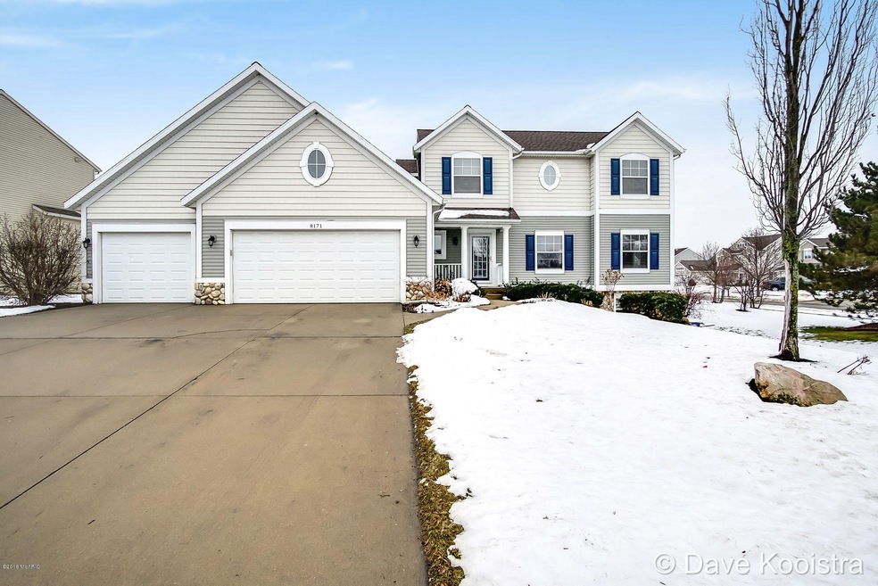 8171 Hawkshead SE unit 35, Byron Center, MI 49315 - photo 1