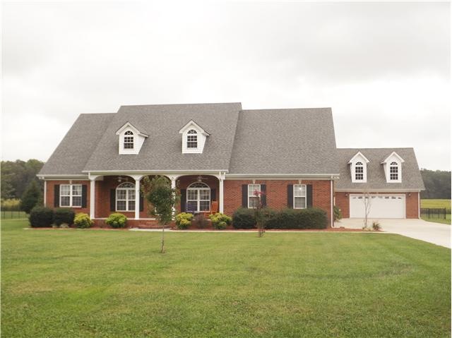 This beautiful all brick home features a double attached garage & a detached garage with second level storage that could easily be finished as a 