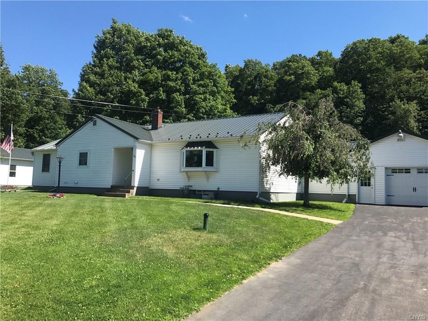 Ranch with attached garage. Newer garage doors