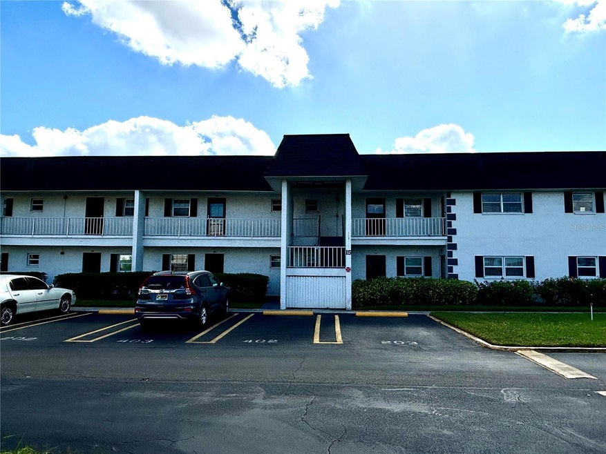 cheerful 1 bed, 1 bath first-floor condo in the vibrant 55+ Burgundy community