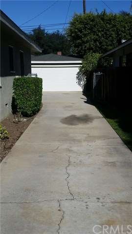 Long driveway to 2 car detached garage
