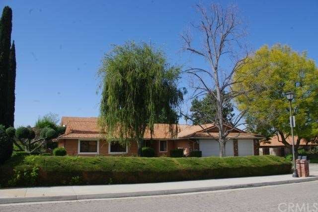 FRONT OF HOME ON QUIET CUL DE SAC WITH MATURE LAND