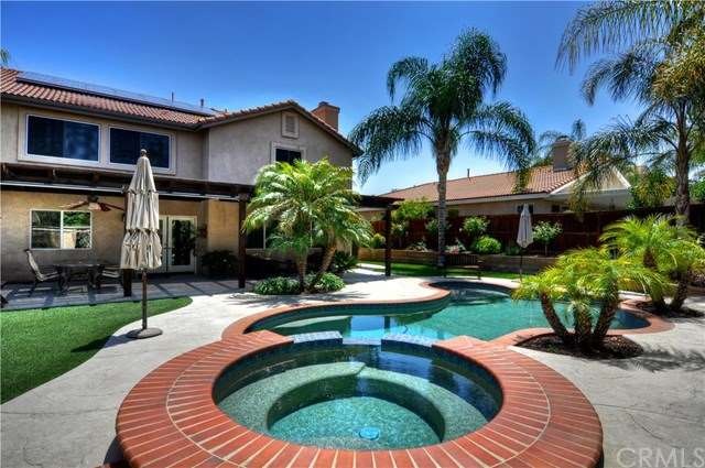 Amidst your oasis sits the glistening pool and spa