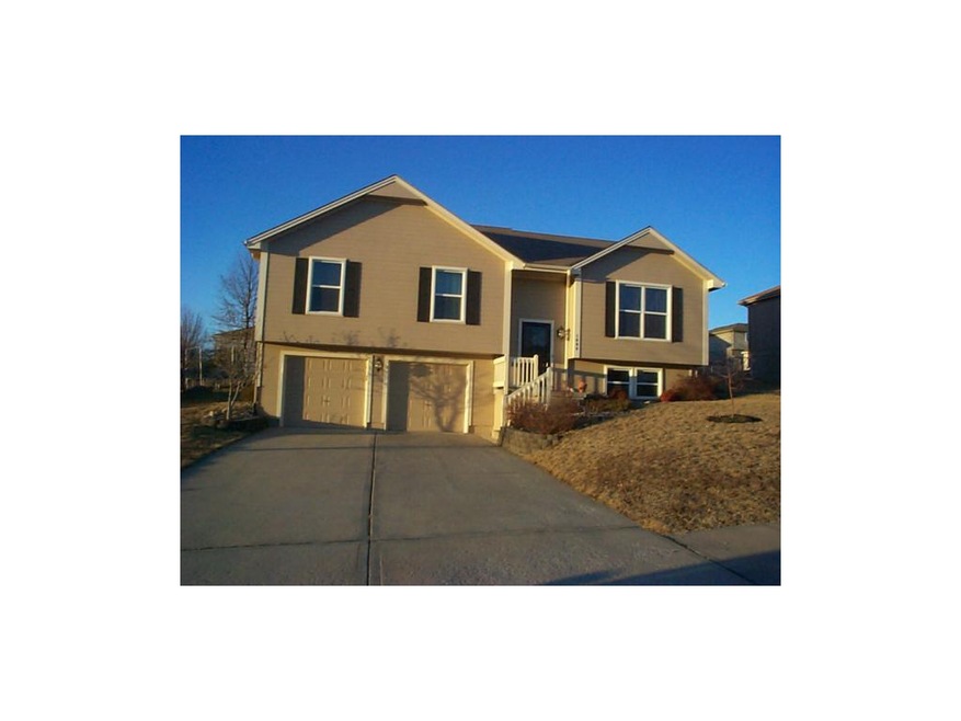 1608 Johnston Dr, Raymore, MO 64083 - photo 1