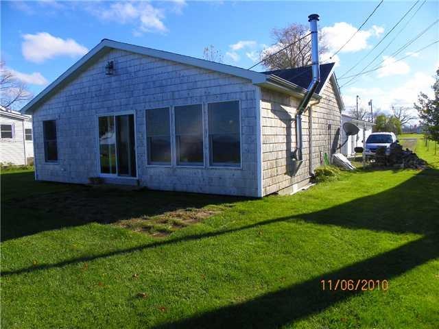 Exterior Front Newer  weathered Cedar Shake shingl