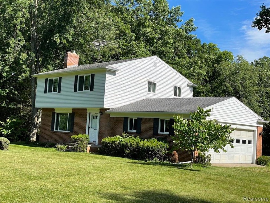 4-sided brick colonial on 10 acres.