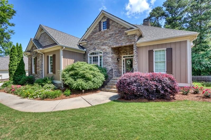 Adorable home with stone, shake and board & batten