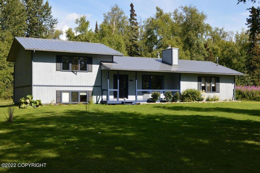 View of Home & Beautiful Yard