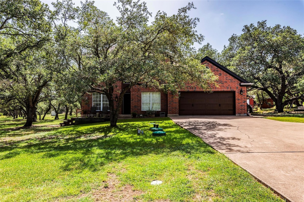 111 Twin Saddles Ln, Dripping Springs, TX 78620 - photo 1