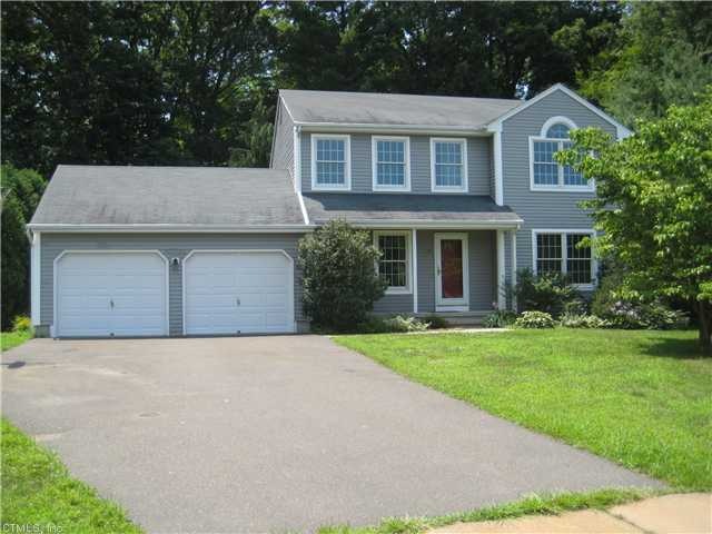 Exterior Front. LARGE DRIVEWAY.