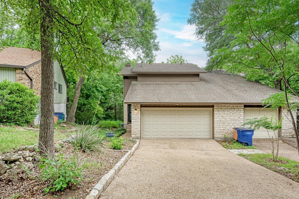 Garage with aphalt driveway
