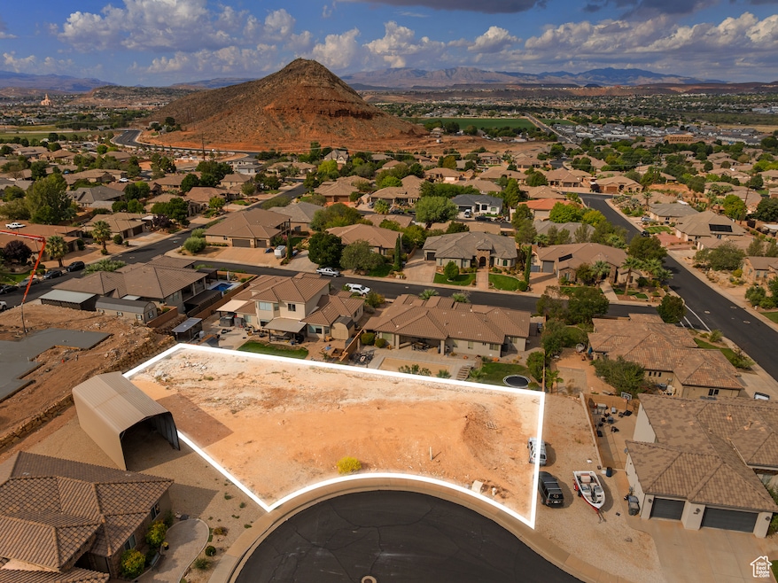 Aerial view of residential area with a mountainous background