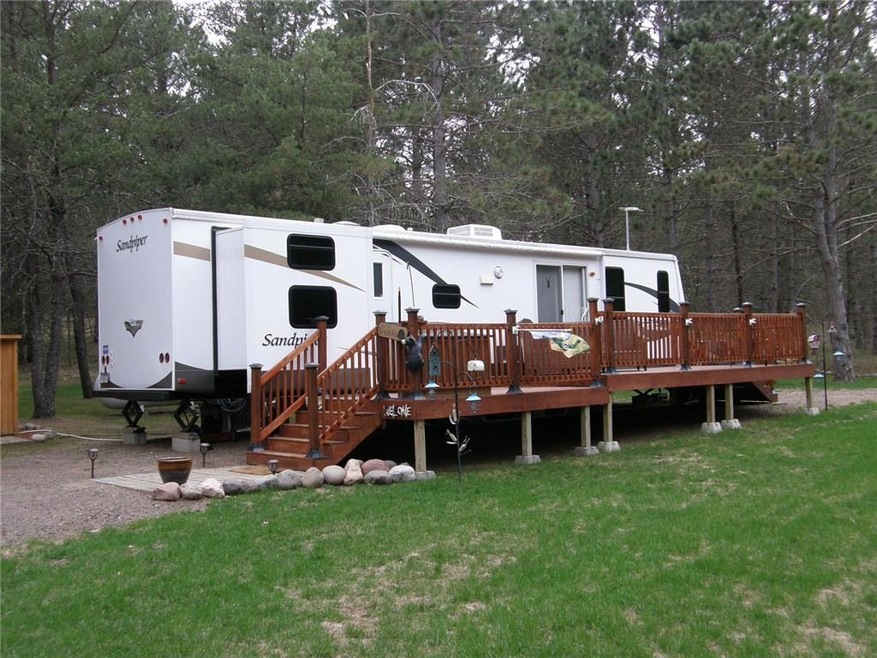 Front Entry from Road. There's lots of extra parking space to the left.