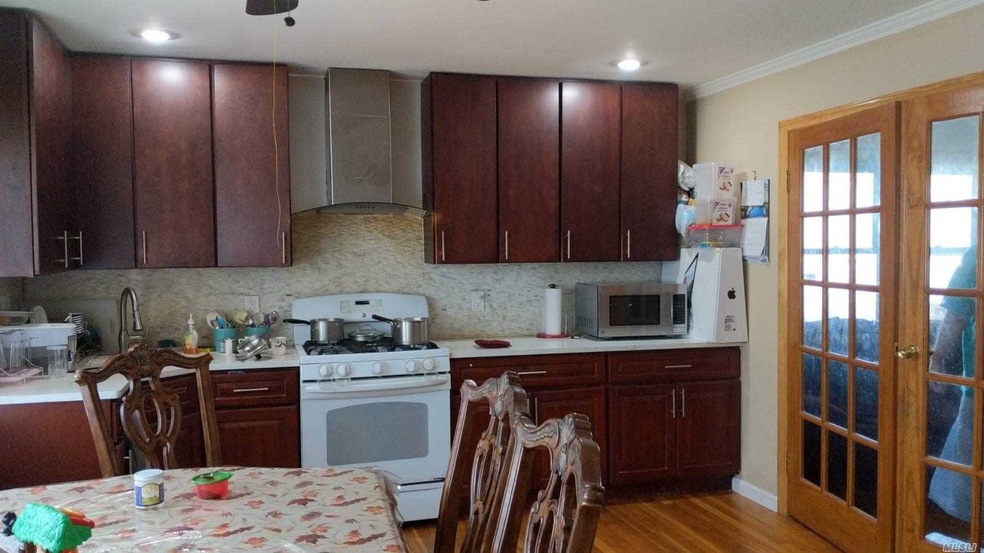 83-03 Langdale St unit 1st Fl, New Hyde Park, NY 11040 - photo 1