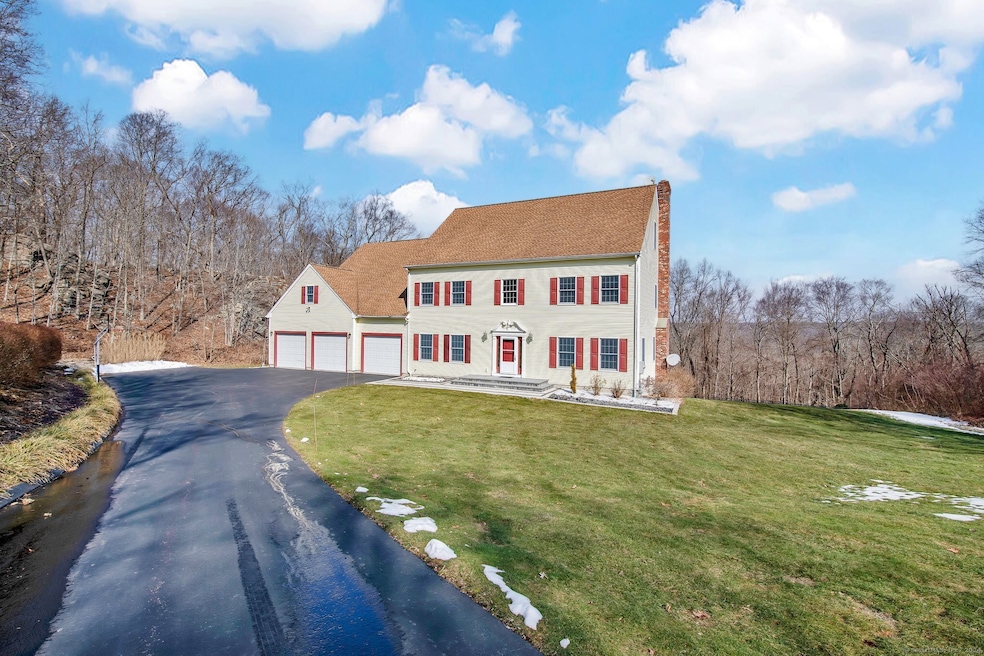 Stunning Colonial in private country setting.