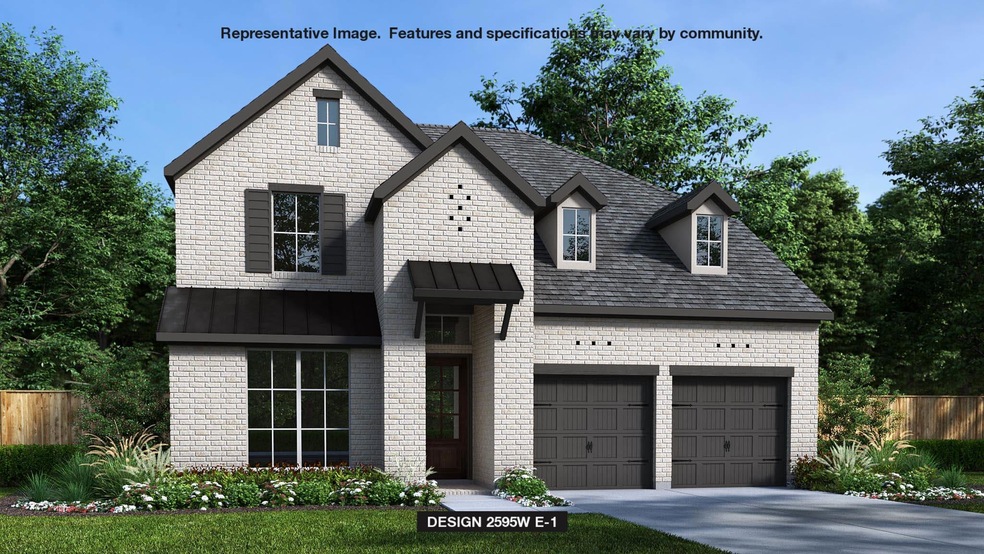 View of front of home featuring brick siding, con