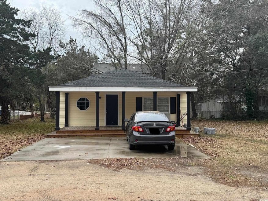 View of front of house featuring covered porch