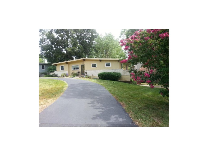 Ranch style home with circle drive in front...side