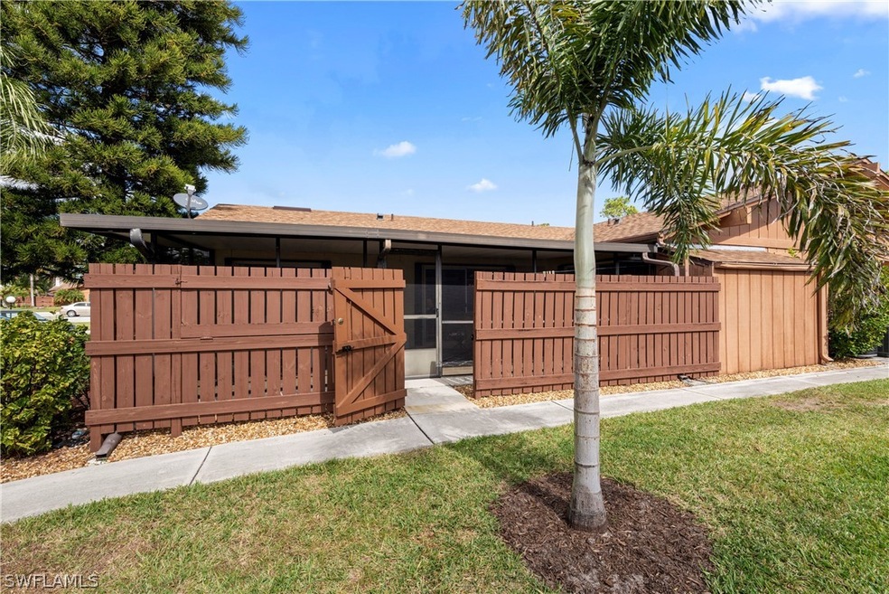 Front view of the home. This home is referred to as a quad. It is an attached villa. There are a total of 4 homes attached.