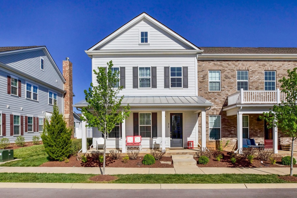 Wonderful End unit with tons of natural light, fenced back yard and detached 2 car garage