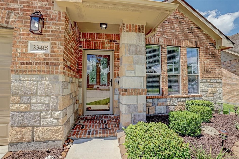 23418 W Pine Ivy Ln, Tomball, TX 77375 - photo 1