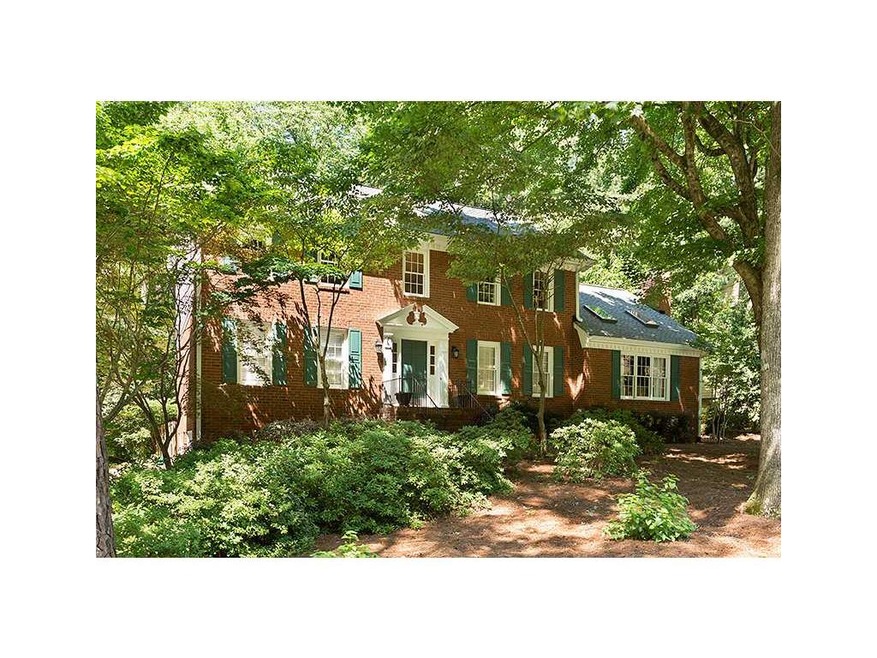 Exterior Front. Three-Sided brick home in North Ri