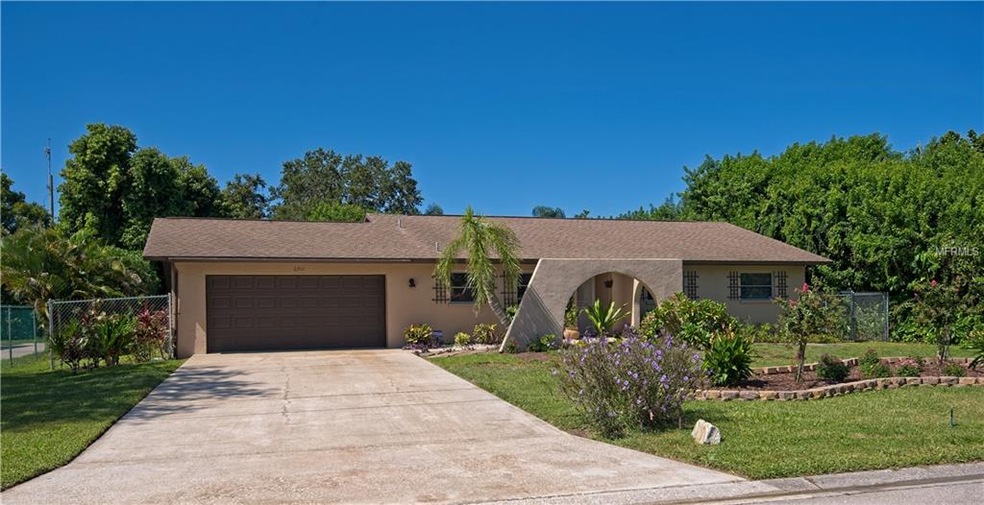Front of Home with extra wide driveway