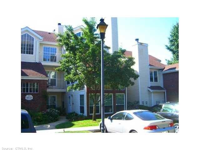 Exterior Front. first floor unit, ample parking fo