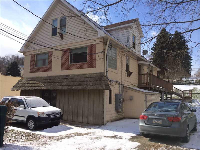Exterior Front. Two nicely updated units, with a f