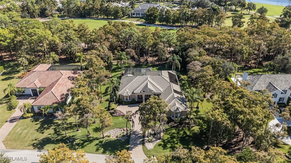 12902 Pond Apple Dr W, Naples, FL 34119 - photo 1