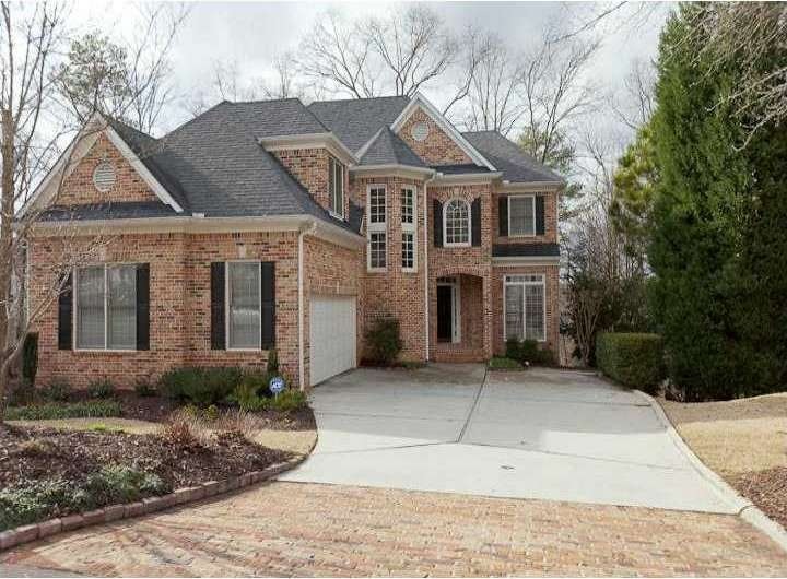 Exterior Front. Charming brick traditional with le