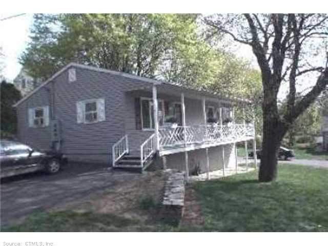 Exterior Front. Unique duplex with full porch. Ver