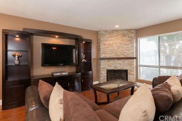 The living room offers tons of space with a newer 