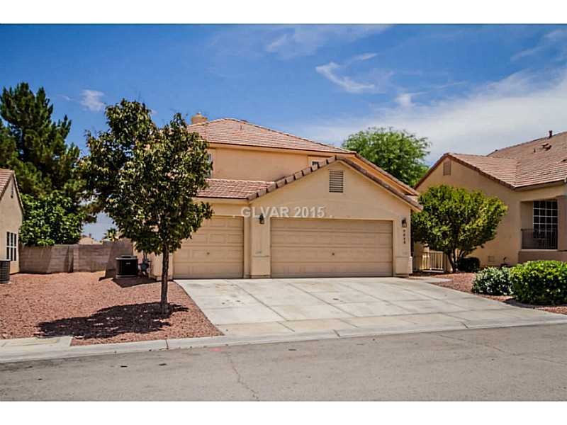 Property Photo. Front: 2 story, 3 car garage, 4 Be