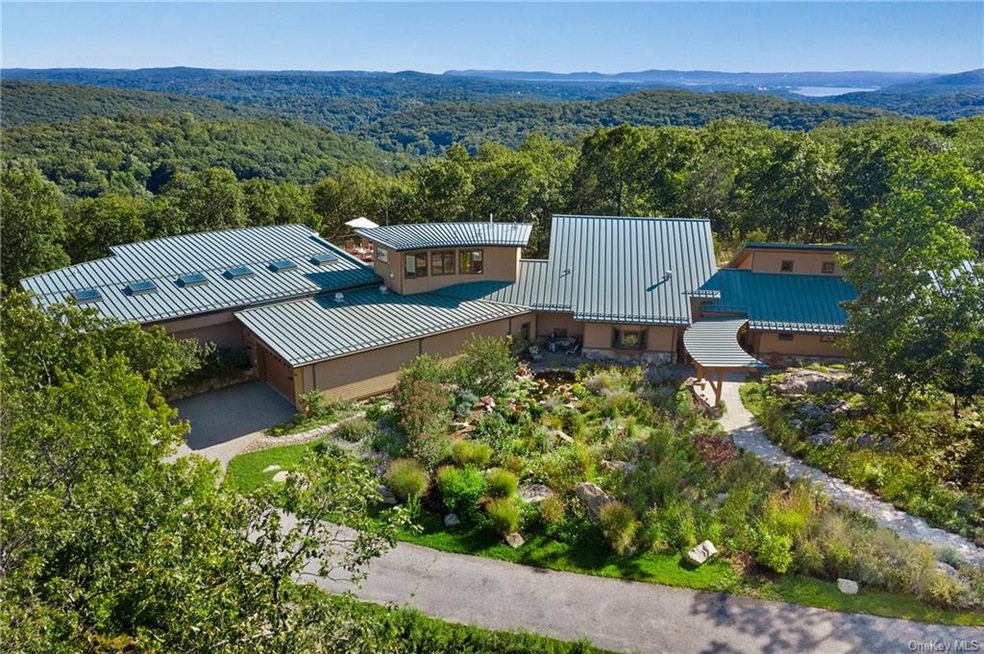Closeup Drone View of Home, Circular Drive & River