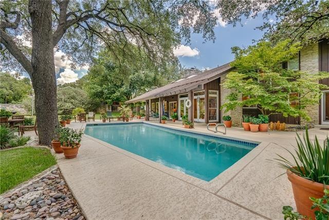 The meticulous grounds have multiple outdoor livin
