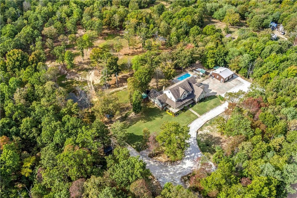 This estate sits on a rectangle 5 acre track. The