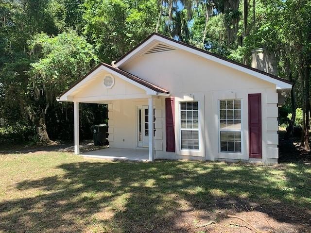 136 Menendez Ave, Saint Simons Island, GA 31522 - photo 1