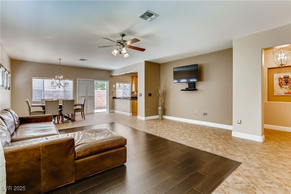 Living room featuring light tile patterned floors,
