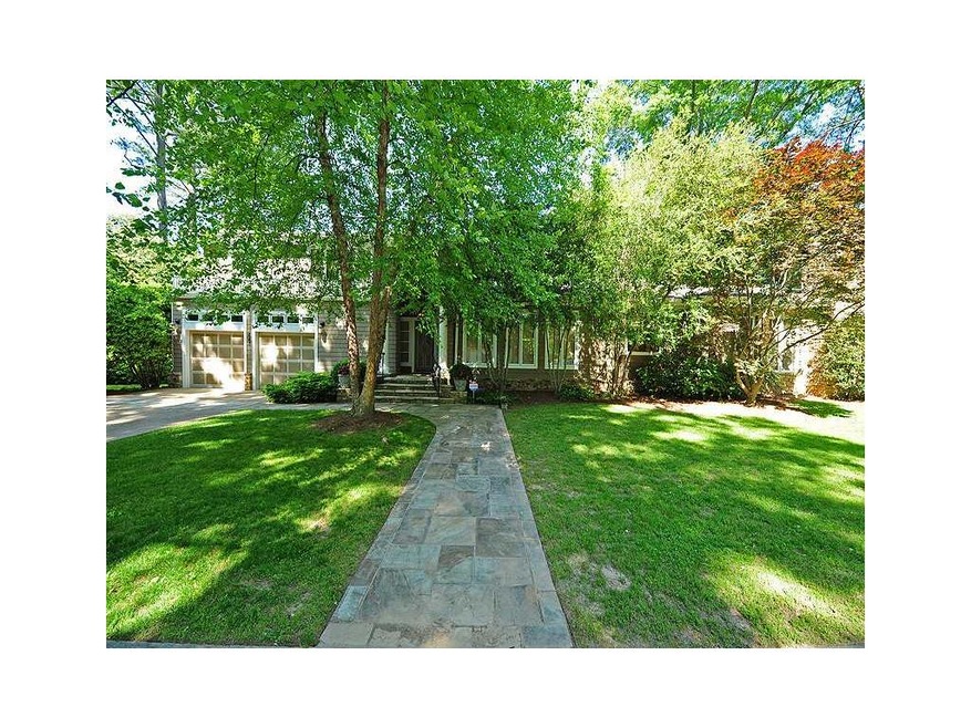 Exterior Front. Custom Home of Renowned Atlanta De