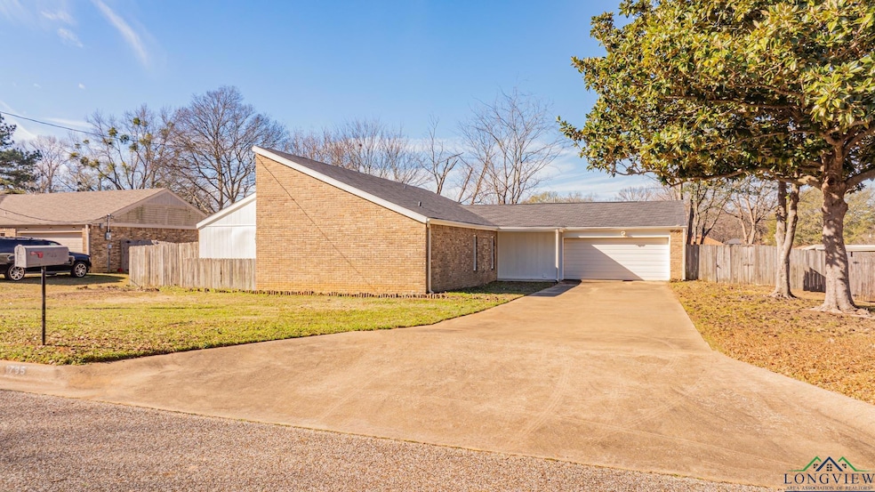 View of front of home featuring a garage and a fro