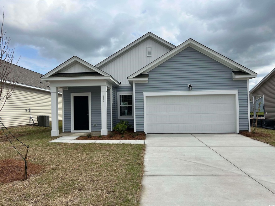 View of front of property featuring cooling unit, 