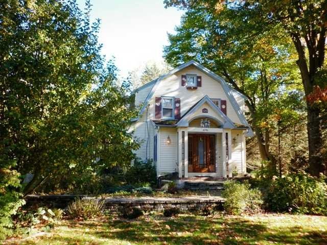 Exterior Front Beautiful stonework, landscaping wi