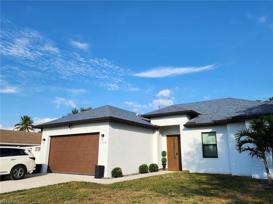 Prairie-style house featuring a garage and a front
