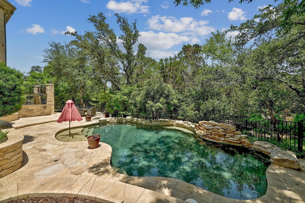 A sparkling in-ground pool provides the perfect place to cool off during warm Texas summers.
