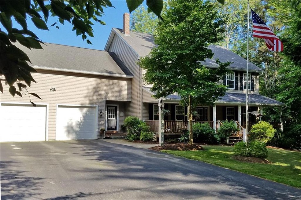 The 2 car garage can be accessed...